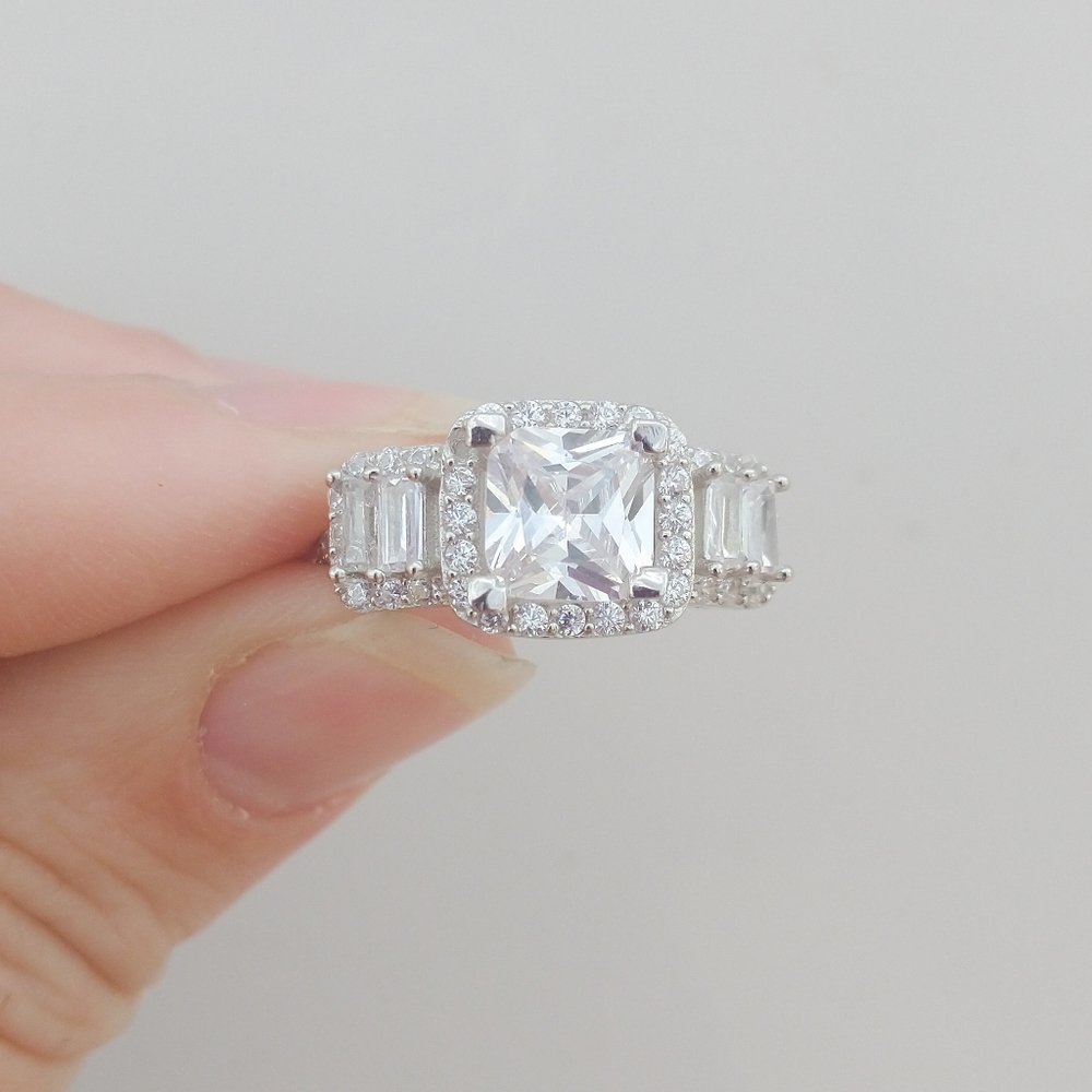 2ct princess cut halo with radiant side stones sz7